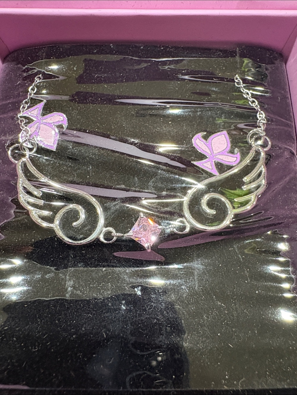 Silver Winged Pendant Necklace with Pink Crystal Accent